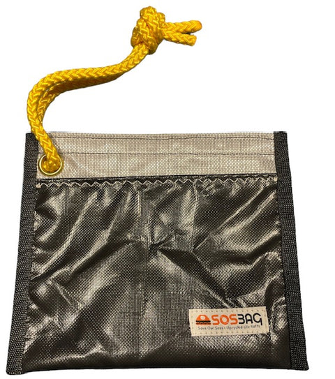BOLSO SOSTENIBLE TIPO CLUTCH MINI GRUMET.