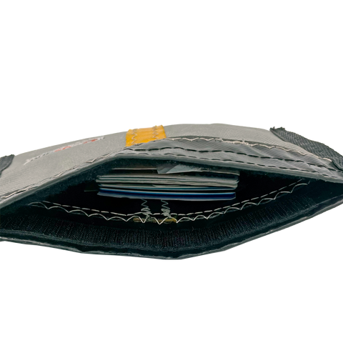 BOLSO SOSTENIBLE TIPO CLUTCH MINI GRUMET.